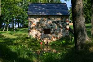 A fully restored stone spring house