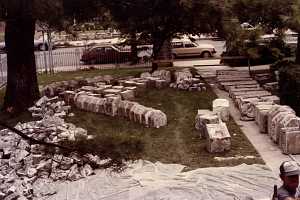 Disassembled pieces of a stone archway