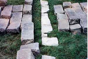 stones laid out in grass