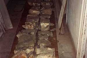 natural stones laid out in a hallway for reuse